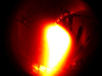 10th December 2015: The first plasma in Wendelstein 7-X. It consisted of helium and reached a temperature of about one million degrees Celsius. (coloured black-and-white photo)